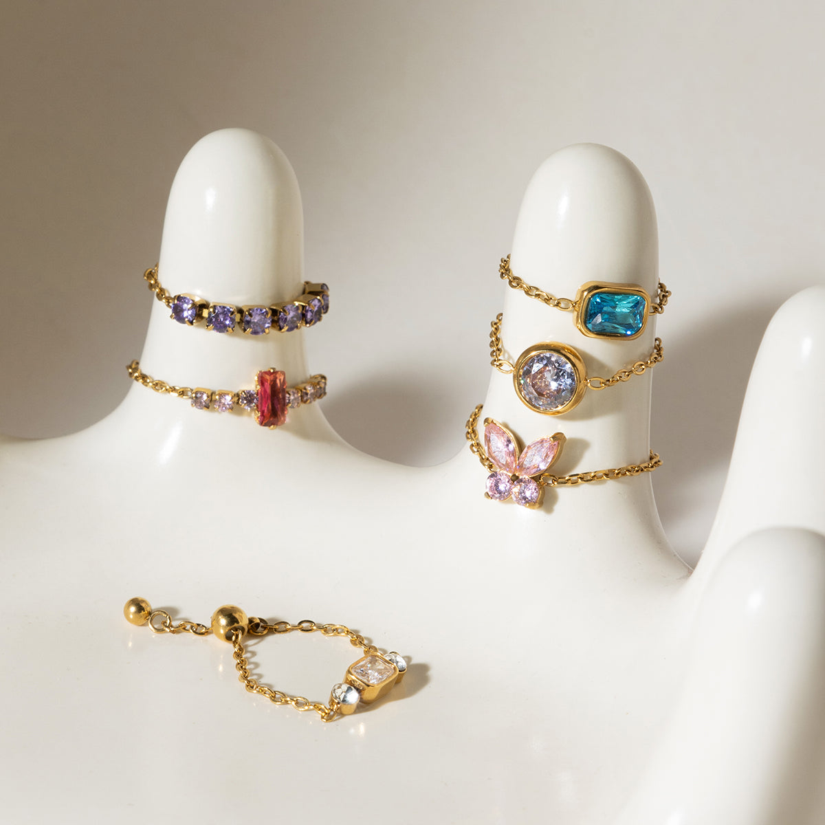 Coloured Pull Me Rings on display