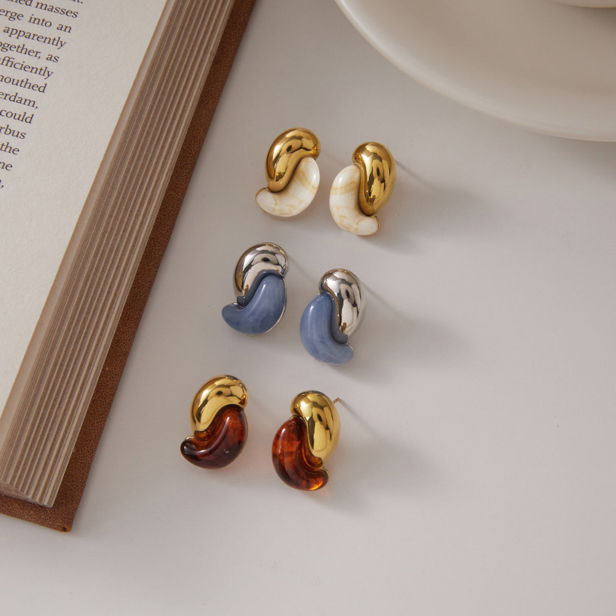 Alba stud earrings in colours with glossy amber-toned accents