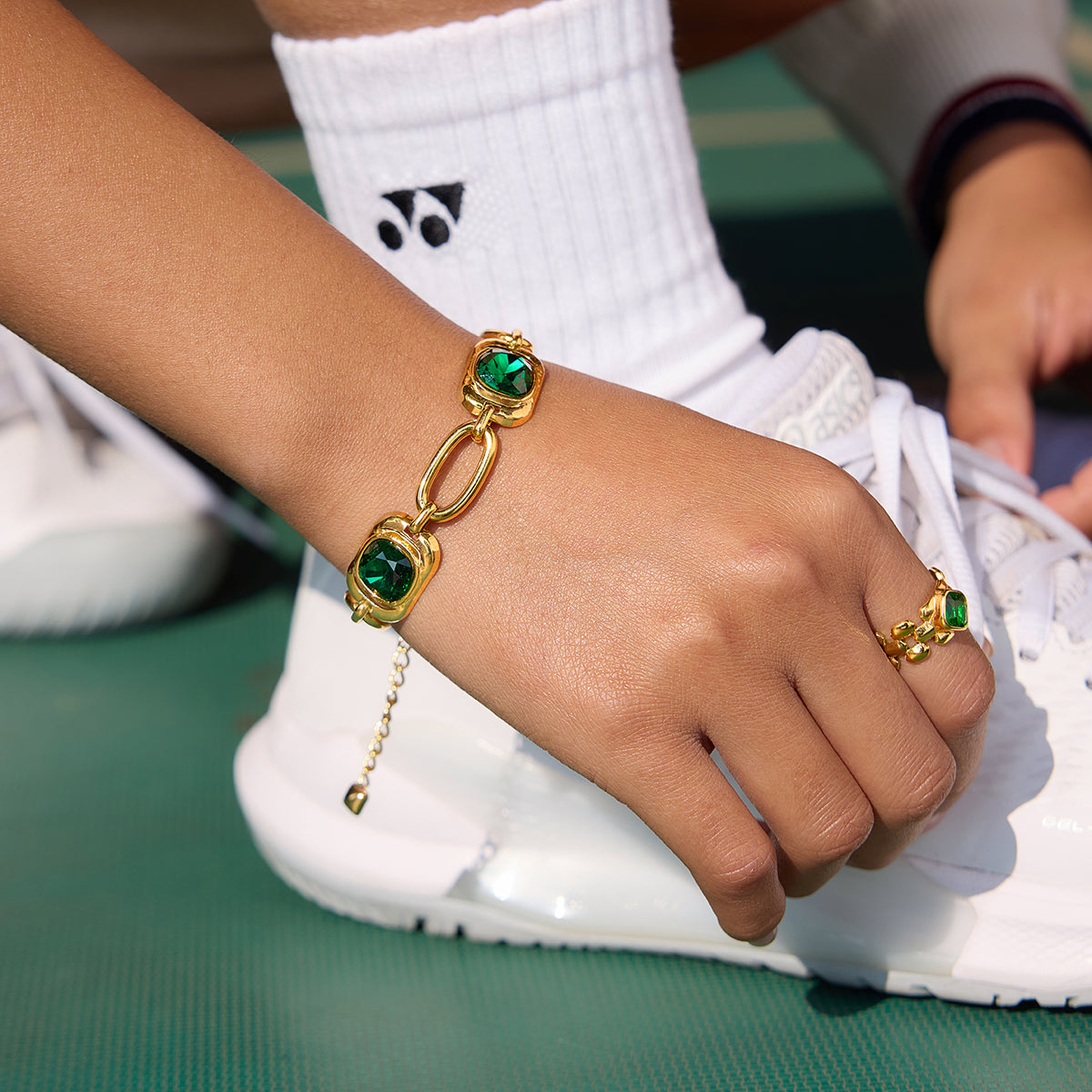 Green Stone Link Bracelet on a model 