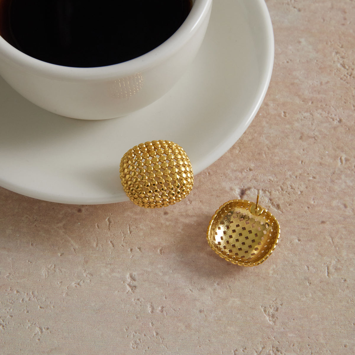 Gold-tone Honeycomb Studs shown from the front and side