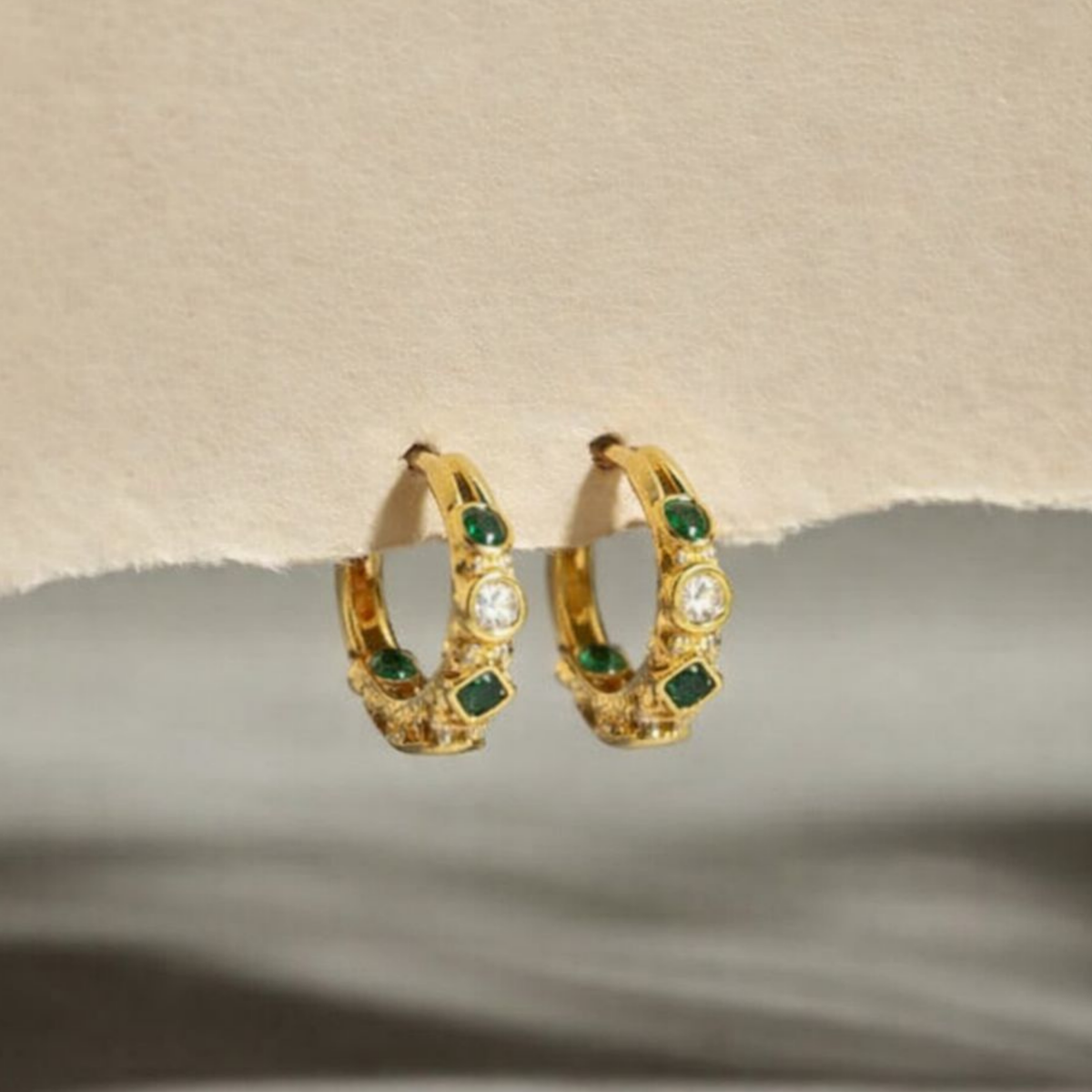 Green and white gold studded hoops 