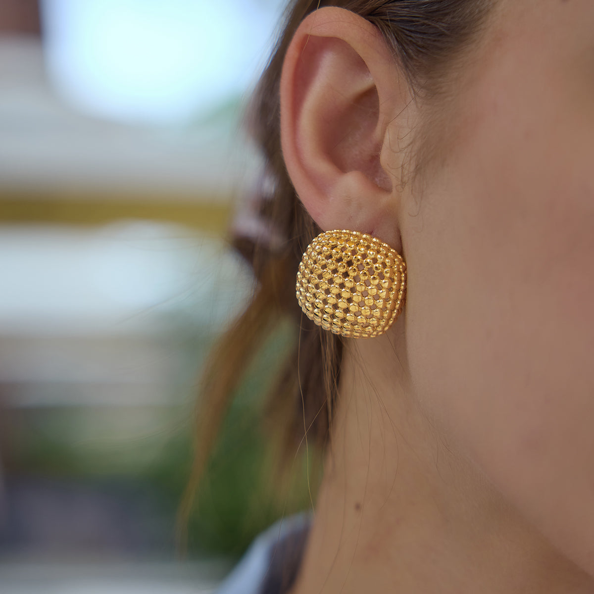 Honeycomb statement studs on a model side look