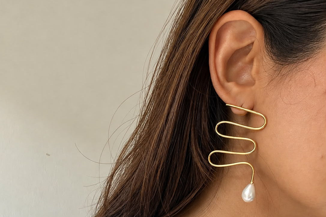 Moti Swirl Earrings worn by model 