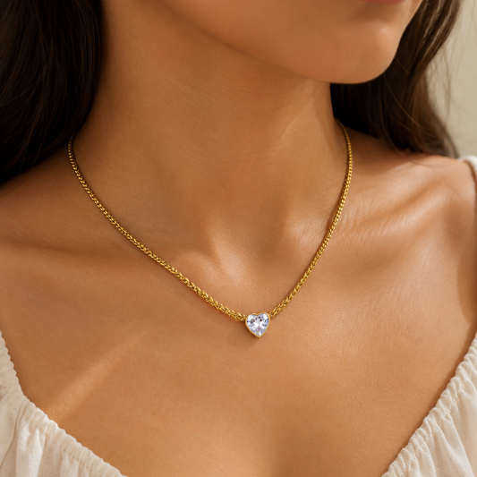 Girl wearing the Sweetheart Drop Necklace with a white top