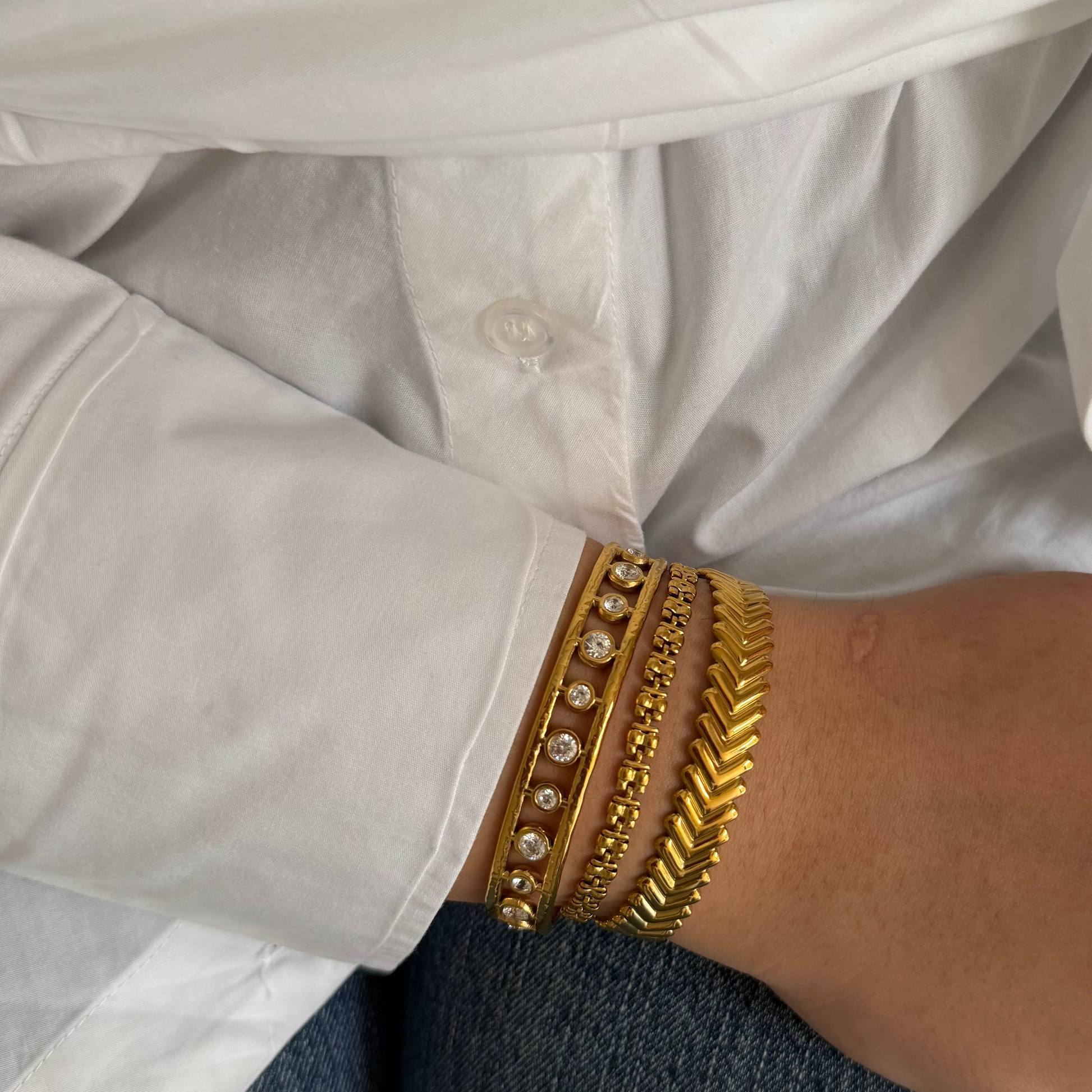 Teer Golden Cuff Bangle Stack worn by a model