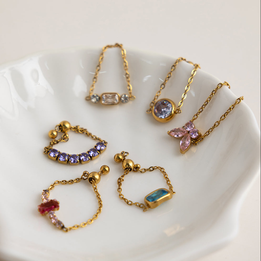 Trio Stone Pull Me Ring along with other rings